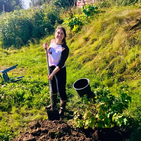 Kristen Faulkner gardening when she was younger in Alaska.